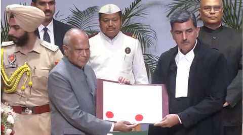 Justice Sheel Nagu with  Punjab Governor Banwarilal Purohit during the swearing ceremony