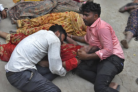 Hathras Stampede: Bodies on ice blocks, kin wait for autopsy; others look for missing loved ones.