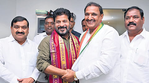 Chief Minister and TPCC president A Revanth Reddy welcomes BRS Serilingampally MLA Arikepudi Gandhi into the Congress fold in Hyderabad on Saturday