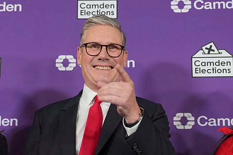 Britain's Labour Party leader Keir Starmer reacts on stage as he is elected for the Holborn and St Pancras constituency, in London, Friday, July 5, 2024.
