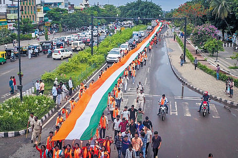 Members of Bharatiya Janata Yuva Morcha take out a Tricolour rally to commemorate Kargil 
Vijay Diwas, in Bhubaneswar on Saturday 