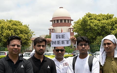 NEET-UG students outside the Suprene court durint the court to here NEET_UG case hearing in New Delhi on Monday. 