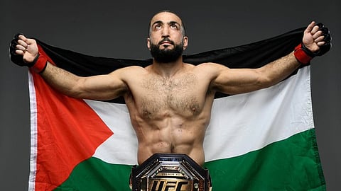 Belal Muhammad waving the Palestinian flag.