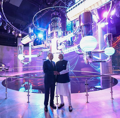 Prime Minister Narendra Modi with Russian President Vladimir Putin at the Atom Pavilion, Russia. 