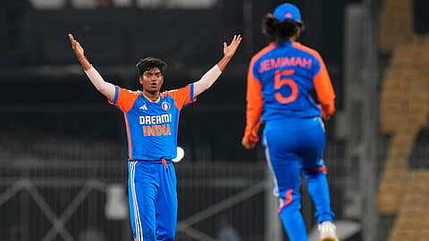 India's bowler Pooja Vastrakar with teammate celebrates after taking the wicket of South Africa's batter Marizanne Kapp during the third T20 cricket match between India Women and South Africa Women, at the MA Chidambaram Stadium in Chennai, Tuesday, July 9, 2024. 