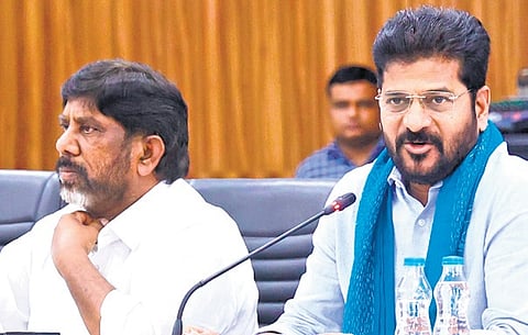 CM Revanth Reddy, along with Deputy CM Mallu Bhatti Vikramarka, at a meeting at Praja Bhavan to discuss  crop loan waiver 