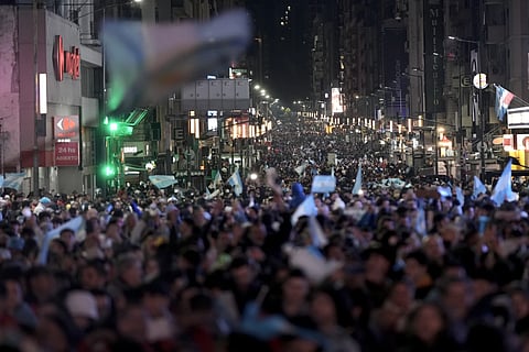 Argentina fans gather on the street after their team defeated Columbia at the Copa America final soccer match in Buenos Aires, Monday, July 15, 2024.