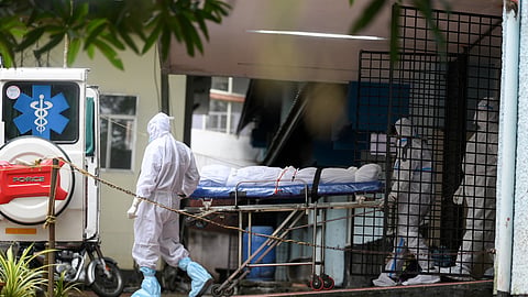 Mortal remains of the Malappuram native who died of Nipah virus being shifted to Kozhikode Medical College mortuary.
