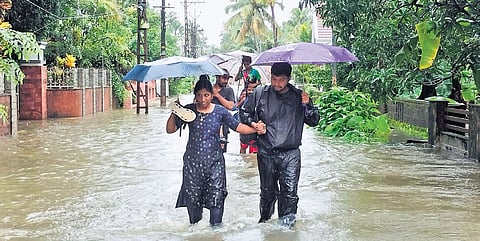 Residents being shifted to relief camps as houses got flooded at Kainoor in Puthur, Thrissur, on Tuesday 