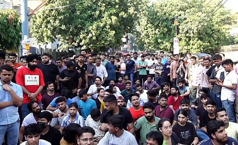 Students stage a protest over the death of three civil services aspirants after the basement of a coaching centre was flooded following heavy rain, in New Delhi, Sunday, July 28, 2024.