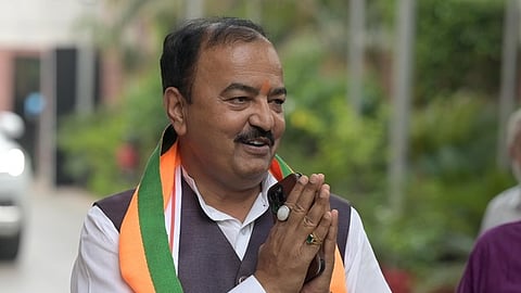 Uttar Pradesh Deputy Chief Minister Keshav Prasad Maurya arrives for a meeting at BJP headquarters, in New Delhi on Saturday. 