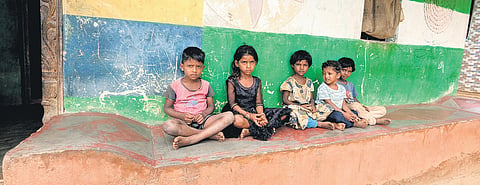 The kids spend their time helping parents in the fields, and playing 