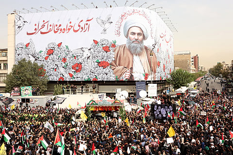 Iranians take part in a funeral ceremony for late Hamas leader Ismail Haniyeh, in Tehran.