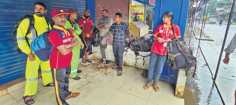 Members of Civil Defence team at Ulliyeri in Kozhikode. They later reached the landslide-hit areas in Wayanad to take part in rescue operations 