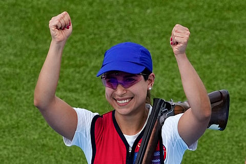 Chile's Francisca Crovetto Chadid celebrates after winning the gold medal in the Skeet women's final at the 2024 Summer Olympics, Sunday, Aug. 4, 2024, in Chateauroux, France. 