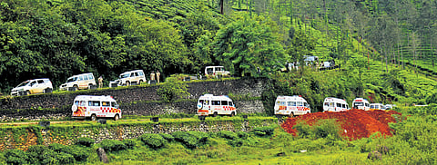 Ambulances taking unidentified bodies and body parts to the mass burial ground at Puthumala in Wayanad on Monday 