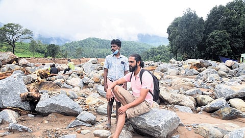 Prashob and Pratheesh who lost 9 members of their family in the landslide at the site where their house stood at Chooralmala, on Friday 