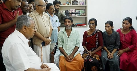 Chief Minister Pinarayi Vijayan during his visit to Arjun's house in Kozhikode
