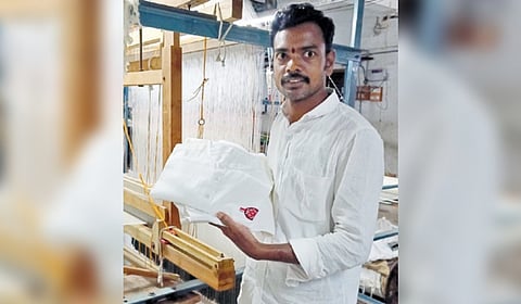 Veldi Hari Prasad shows the linen product he made for Andhra Pradesh Deputy Chief Minister and Tollywood actor Pawan Kalyan