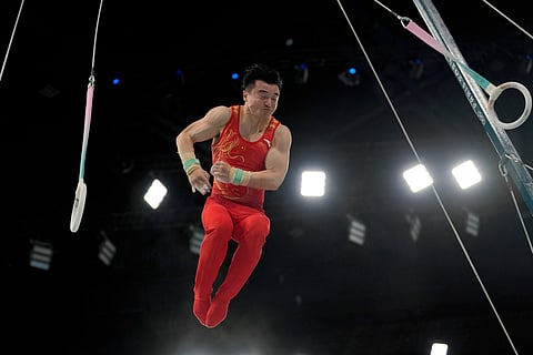 Liu Yang, of China, performs on the rings during the men's artistic gymnastics team finals round at Bercy Arena at the 2024 Summer Olympics, Monday, July 29, 2024, in Paris, France.