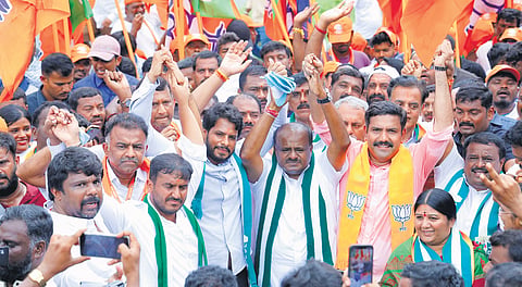 JDS leader and Union Minister for Steel and Heavy Industries HD Kumaraswamy, state JDS youth wing president Nikhil Kumaraswamy, state BJP chief BY Vijayendra and others at the NDA padayatra in Ramanagara on Monday  | express
