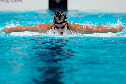 Summer McIntosh, of Canada, competes in the women's 200-meter butterfly final at the 2024 Summer Olympics.