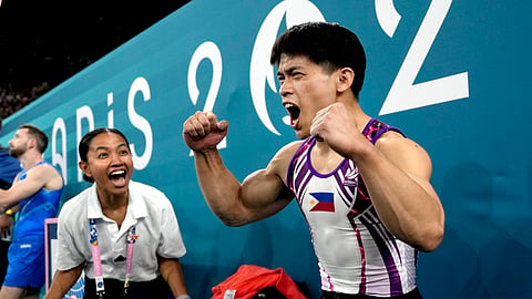 Carlos Edriel Yulo, of the Philippines, celebrates after competing during the men's artistic gymnastics individual floor finals at Bercy Arena at the 2024 Summer Olympics.