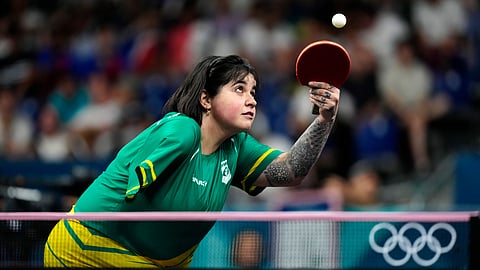 Brazil's Bruna Alexandre plays against South Korea's Lee Eunhye during a women's teams round of 16 table tennis match at the 2024 Summer Olympics.