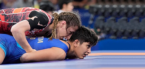 Wrestler Antim Panghal in her bout  with Turkish opponent Zeynep Yetgil