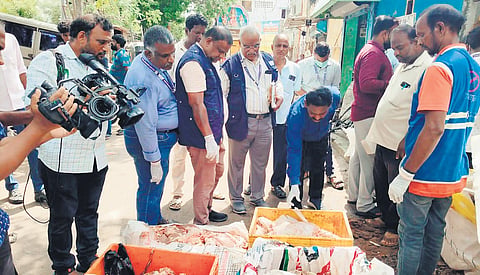 Officials seizing stale meat from a shop Shenoy Nagar on Thursday 