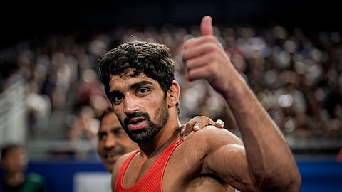India's Aman after winning the men's freestyle 57kg wrestling quarterfinal match against Albania's Zelimkhan Abakarov at the 2024 Summer Olympics, in Paris, France, Thursday, Aug. 8, 2024.