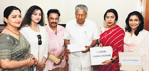 Rajkumar Sethupathi (owner of Kerala Strikers) and actors Suhasini Maniratnam, Khushbu Sundar, Meena Sagar and Lissy Lakshmi hand over a cheque of 
C1 crore to Chief Minister Pinarayi Vijayan on Friday