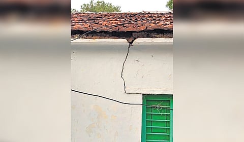 The wall of a house with cracks at Mohammad Gouse Palle in Hanamkonda district due to stone quarry blasts