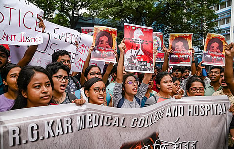 Junior doctors protest against the alleged rape and killing of a trainee doctor, at RG Kar Medical College and Hospital in Kolkata, Saturday, Aug 10, 2024.