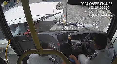 The dashcam footage shows the bus moving slowly and stopping seconds before the accident and again moving
