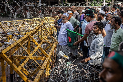 Protesters march to block the house of Sheikh Mujibur Rahman, ‘Bangabandhu’ the first president of independent Bangladesh and father of ousted ex-premier Sheikh Hasina, in Dhaka on August 15, 2024, to mark the anniversary of his assassination.