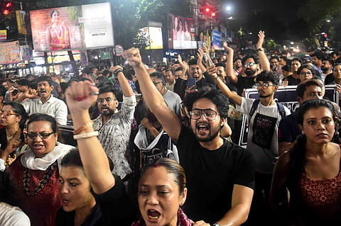 Artists and others during a protest rally against the recent alleged rape and murder of a woman doctor at RG Kar Medical College and Hospital, in Kolkata, Sunday, Aug. 18, 2024.