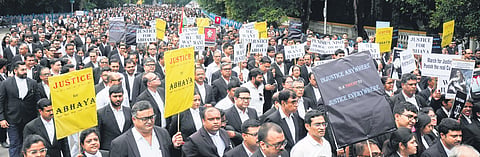 Calcutta High Court lawyers stage a protest against the alleged sexual assault and murder of a trainee doctor at RG Kar College and Hospital, in Kolkata on Monday. 