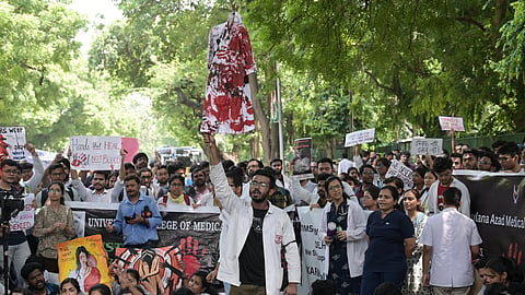 Doctors stage a protest march against the rape and murder of a trainee doctor in Kolkata. 