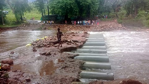 A temporary bridge connecting Mothiramalai- Kutriaaru got damaged due to flash flood at Kanyakumari district. 