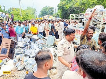 Framers and residents dumping electricity meters outside TPWODL office as they protest over inflated bills.