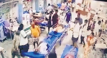 A screen grab of the video where a man can be seen approaching the female intern from behind and attacking her in the casualty ward of SVIMS in Tirupati 