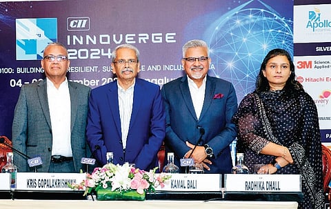 (From left) CII Karnataka vice-chairman Rabindra Srikantan, CII India Innoverge 2024 mentor Kris Gopalakrishnan, CII India Innoverge 2024 chairman Kamal Bali, and CII Karnataka state head Radhika Dhall address a press conference in Bengaluru on Monday. 