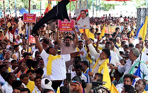  Members of various community organisations and supporters protest against Governor Thawar Chand Gehlot for ordering prosecution to Chief Minister Siddaramaiah at Freedom Park in Bengaluru on Tuesday.