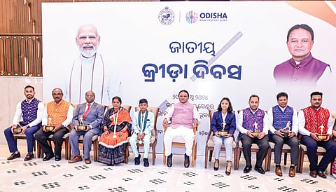 Chief Minister Mohan Majhi along with the awardees at Lok Seva Bhawan 