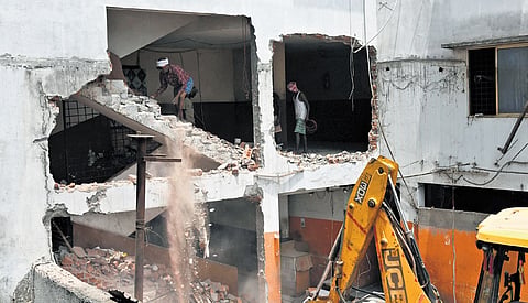 Hyderabad Disaster Response & Asset Monitoring and Protection Agency (HYDRAA) demolished a toddy compound built on a nala in Ram Nagar on Friday 