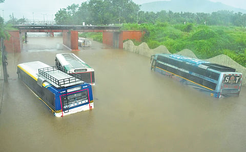 Following heavy rains, buses were stranded near the Pandit Nehru Bus Station in Vijayawada 