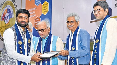 Ramco Group of Companies Chairman PR Venketrama Raja giving away certificates in the presence of Chancellor R Sethuraman and  V-C S Vaidhyasubramaniam