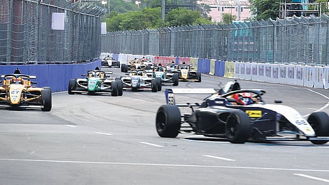 Hugh Barter (68) of Australia winning the the Formula 4 (F4) race 1 Championship cars race during the Indian Formula 4 night street racing at the circuit spans Island Grounds in chennai