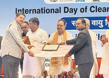Nalgonda municipal officials receive an award on Saturday